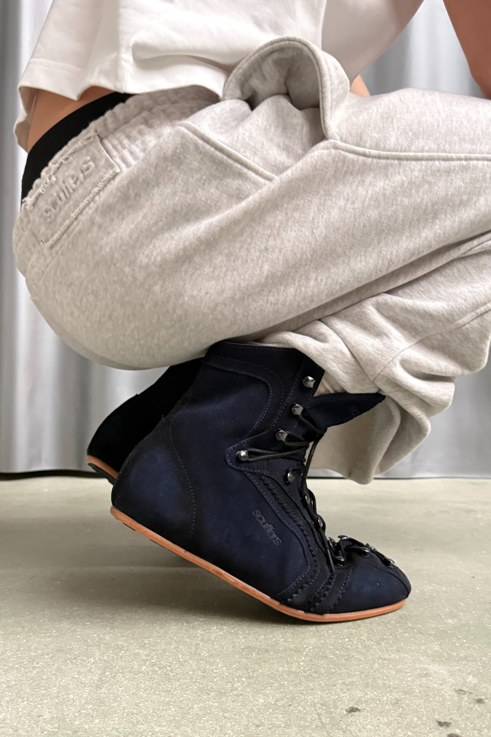 Iconic Navy Suede Boots - Image 10